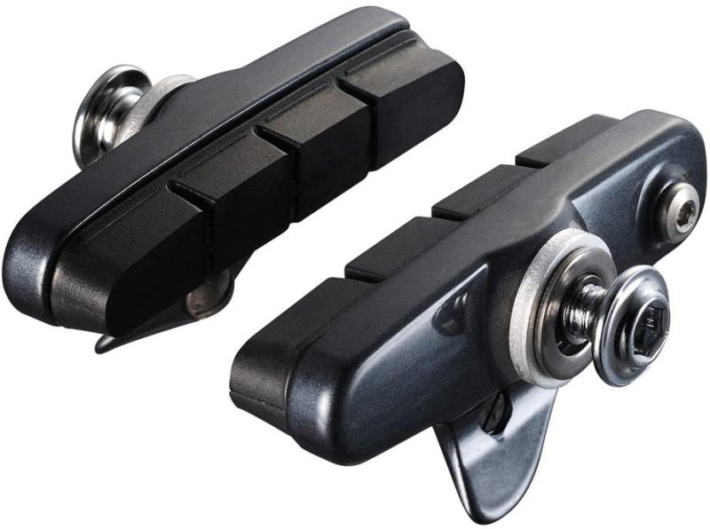 A pair of Shimano brake pads and callipers